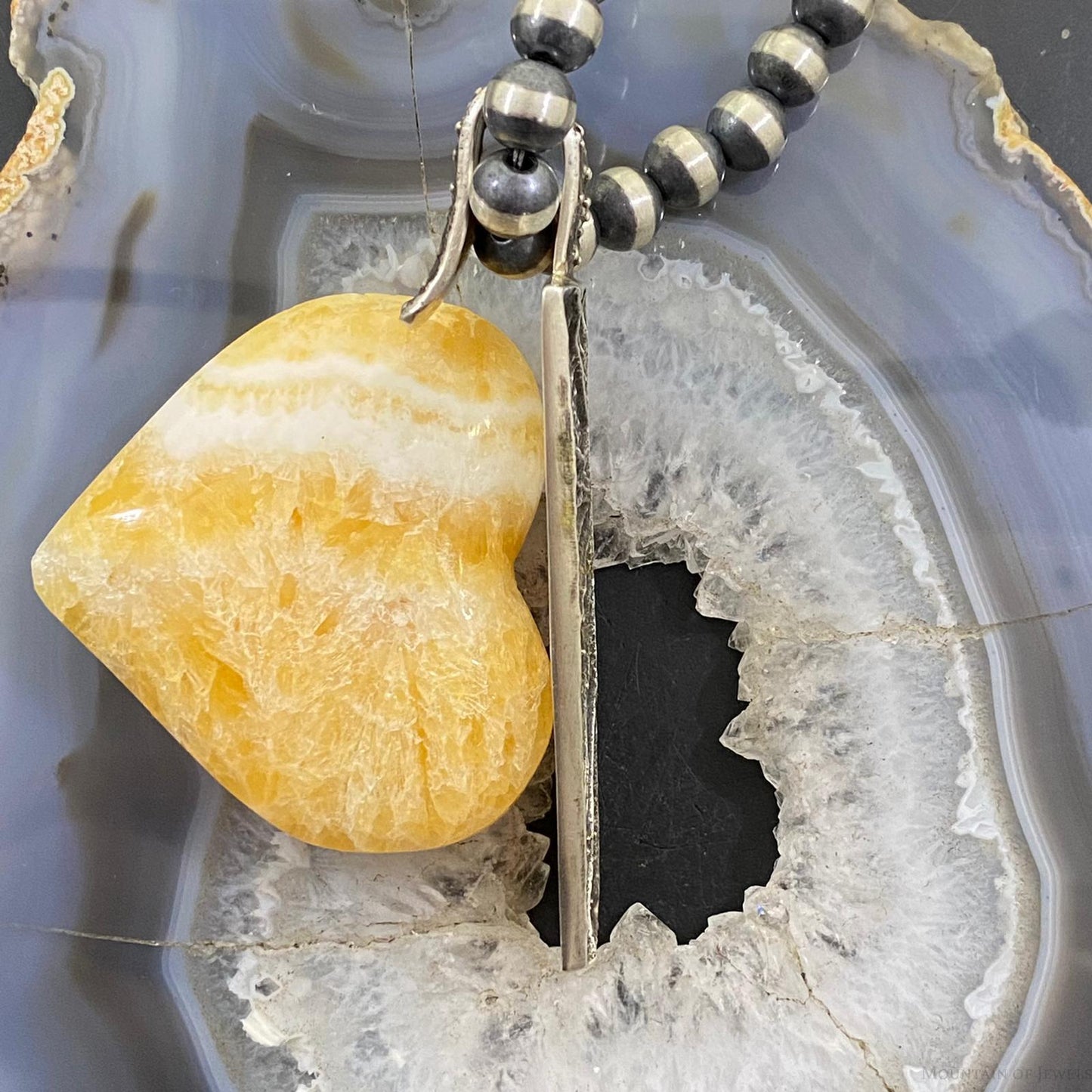 Cheyenne Custer Navajo Sterling Silver Trapeze Decorated Tufa Cast Uni Pendant