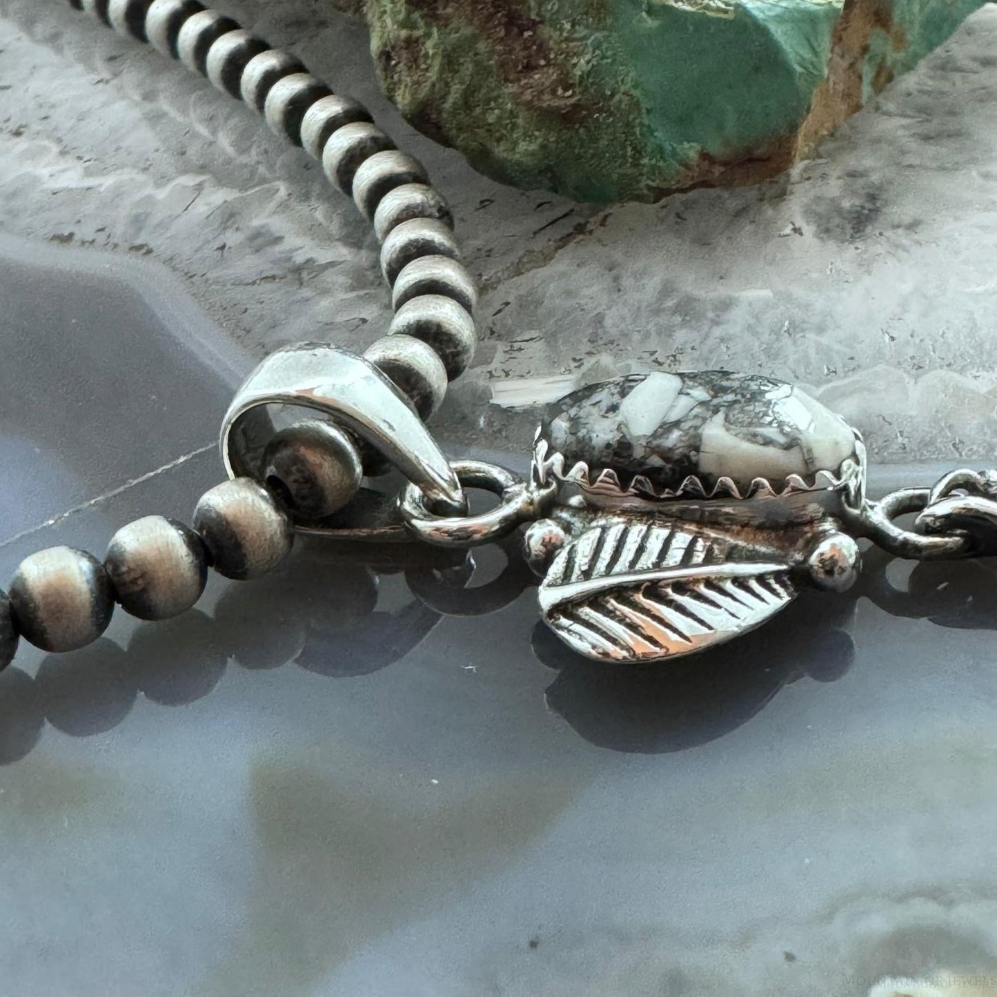Sterling Silver Southwestern Style White Buffalo Feathers w/Leaves Pendant For Women