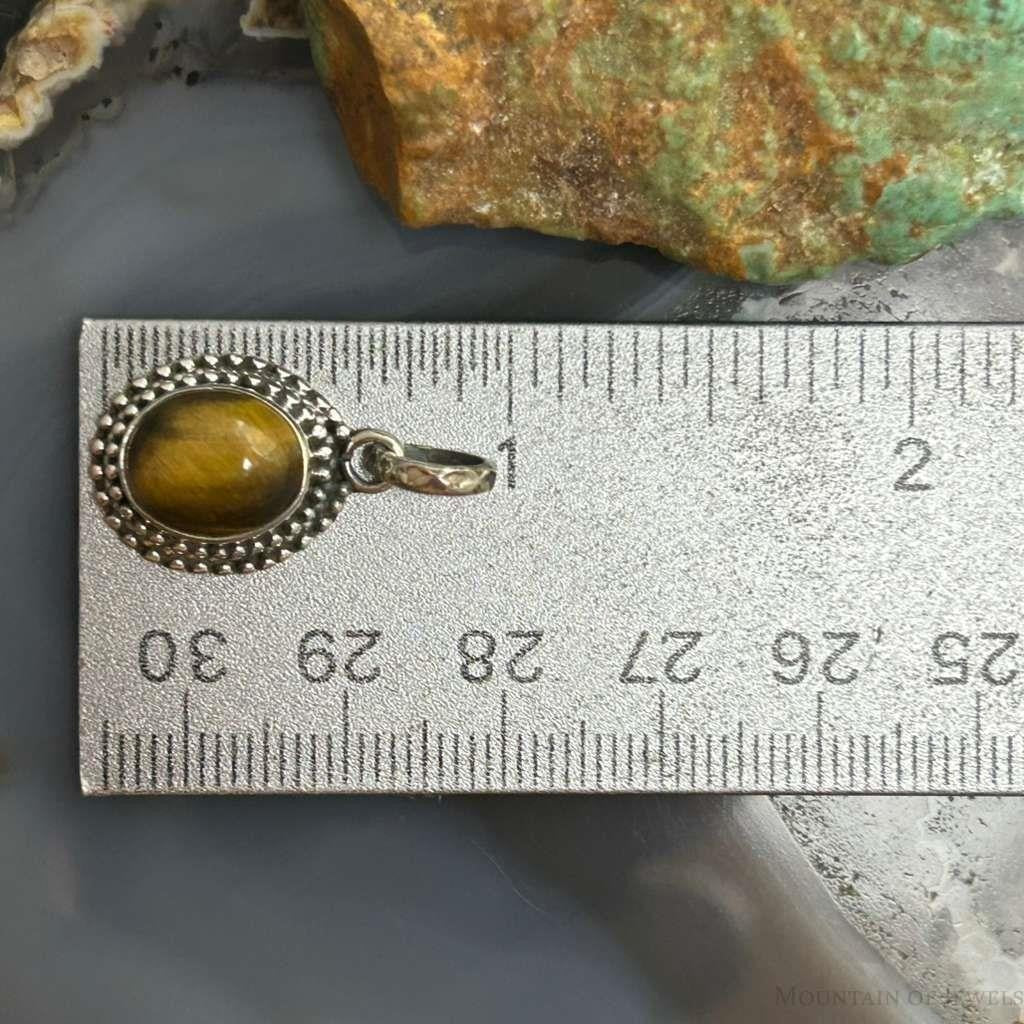 Sterling Silver Southwestern Style Oval Tiger's Eye Decorated Charm/Pendant For Women