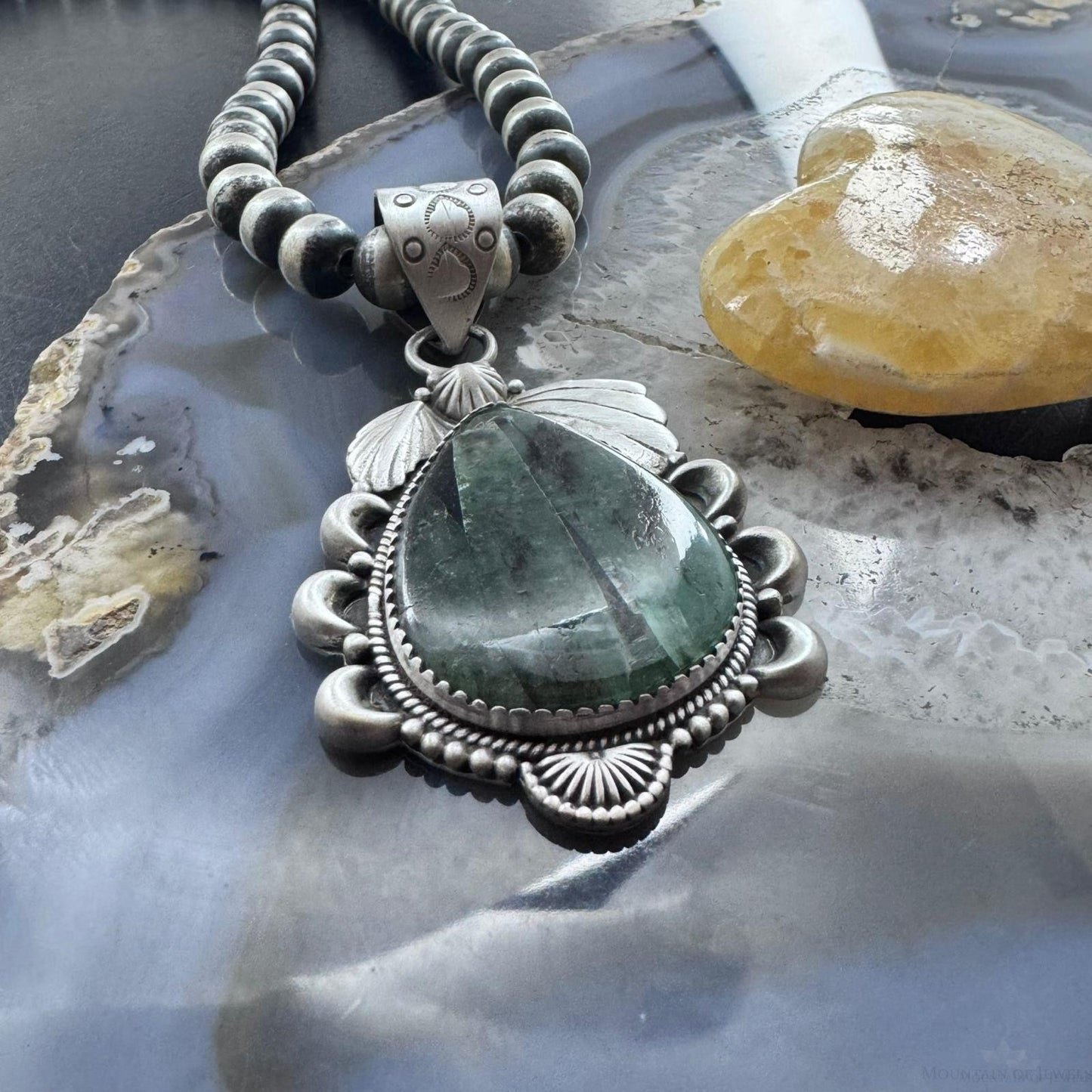 Sterling Silver Southwestern Style Teardrop Natural Emerald Decorated Pendant For Women