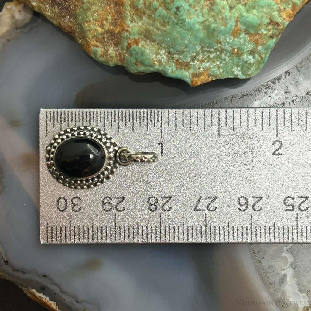 Sterling Silver Southwestern Style Oval Onyx Decorated Charm/Pendant For Women