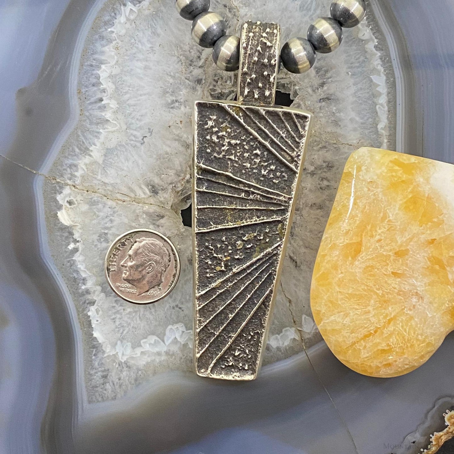 Cheyenne Custer Navajo Sterling Silver Trapeze Decorated Tufa Cast Uni Pendant
