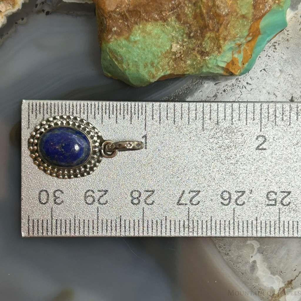 Sterling Silver Southwestern Style Oval Lapis Decorated Charm/Pendant For Women