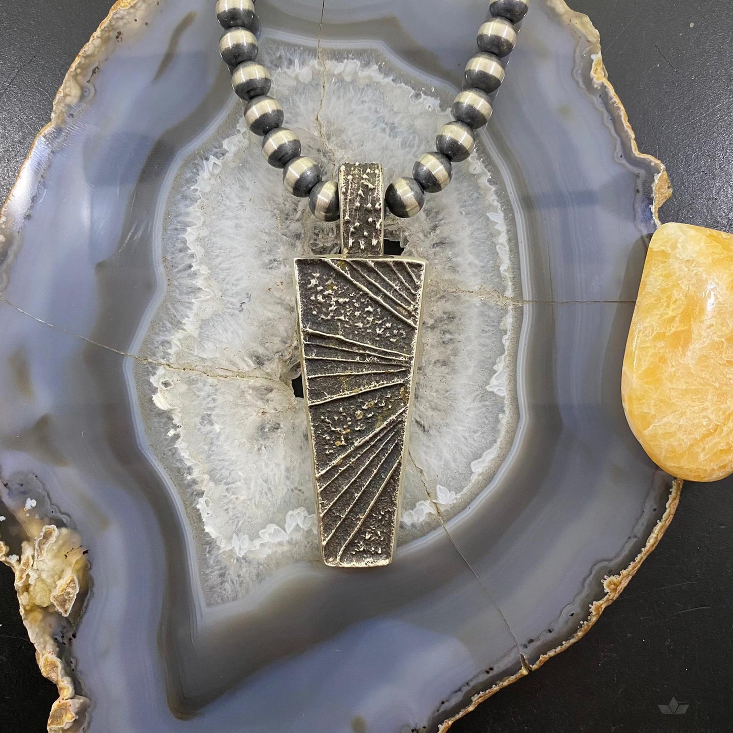 Cheyenne Custer Navajo Sterling Silver Trapeze Decorated Tufa Cast Uni Pendant