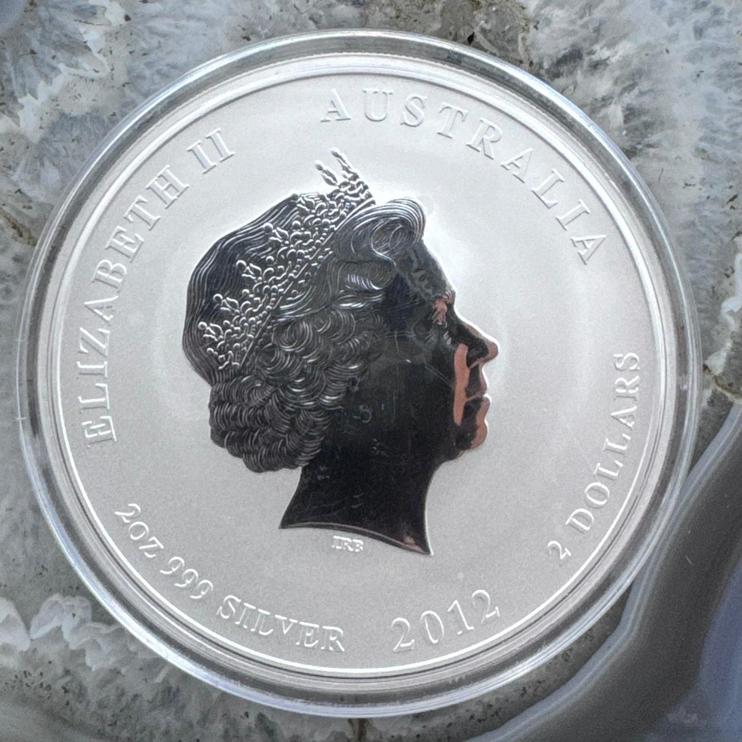 2012 Year Of The Dragon Australia 2 Ounces .999 Fine Silver Round Encapsulated.