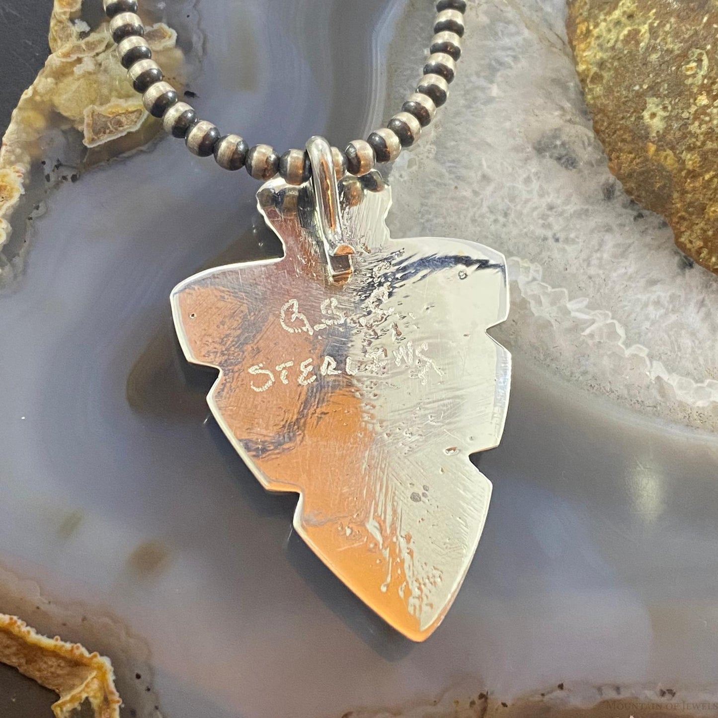 Gary Custer Sterling Silver Tufa Cast Turquoise Bear Claw Arrowhead Uni Pendant - Mountain of Jewels