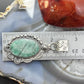 Sterling Silver Southwestern Style Oval Emerald Decorated Pendant For Women