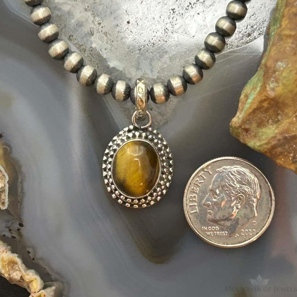 Sterling Silver Southwestern Style Oval Tiger's Eye Decorated Charm/Pendant For Women