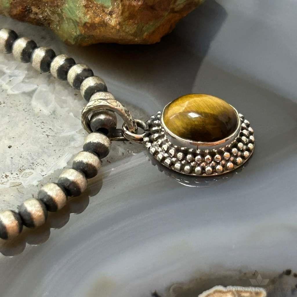 Sterling Silver Southwestern Style Oval Tiger's Eye Decorated Charm/Pendant For Women