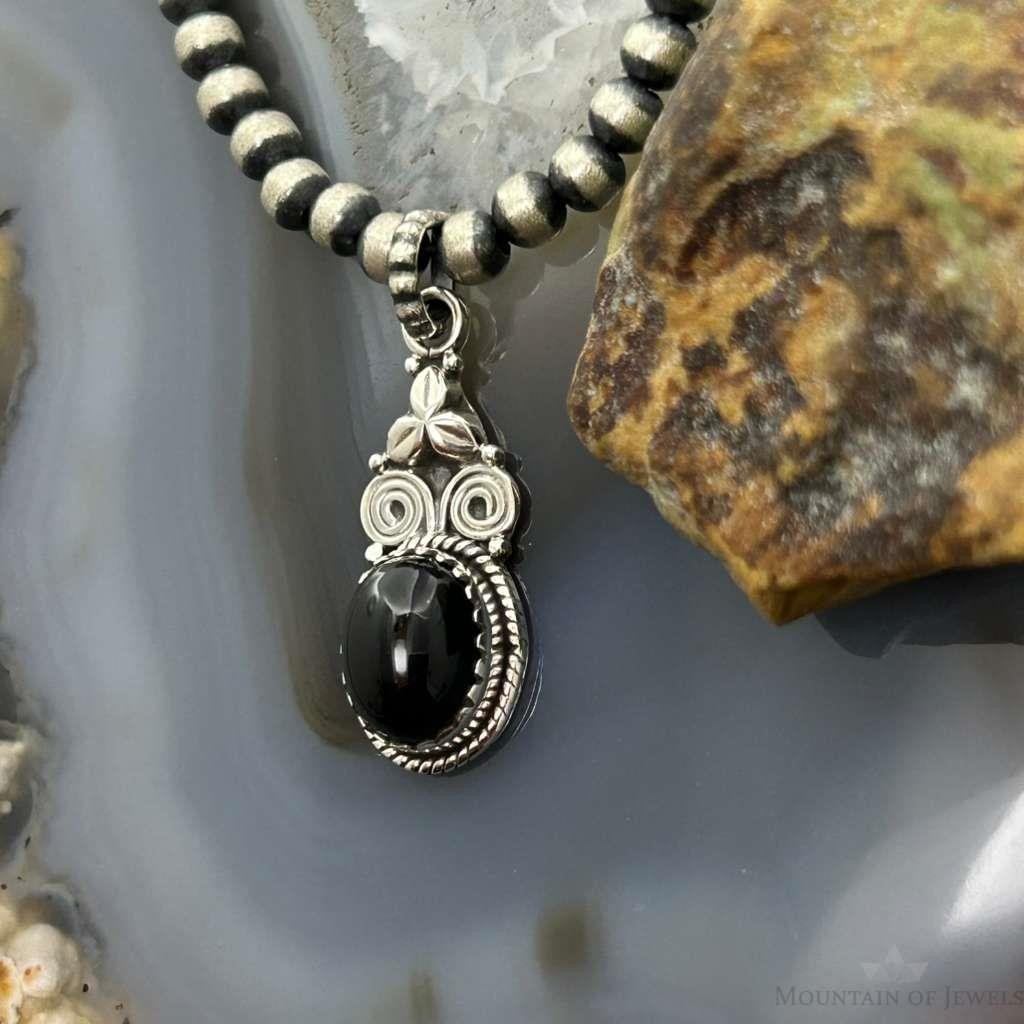 Sterling Silver Southwestern Style Oval Onyx Decorated Charm/Pendant For Women