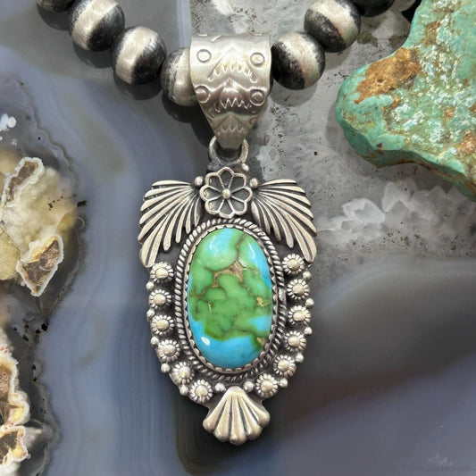 Sterling Southwestern Style Oval Sonora Gold Turquoise Leaves Decorated Pendant