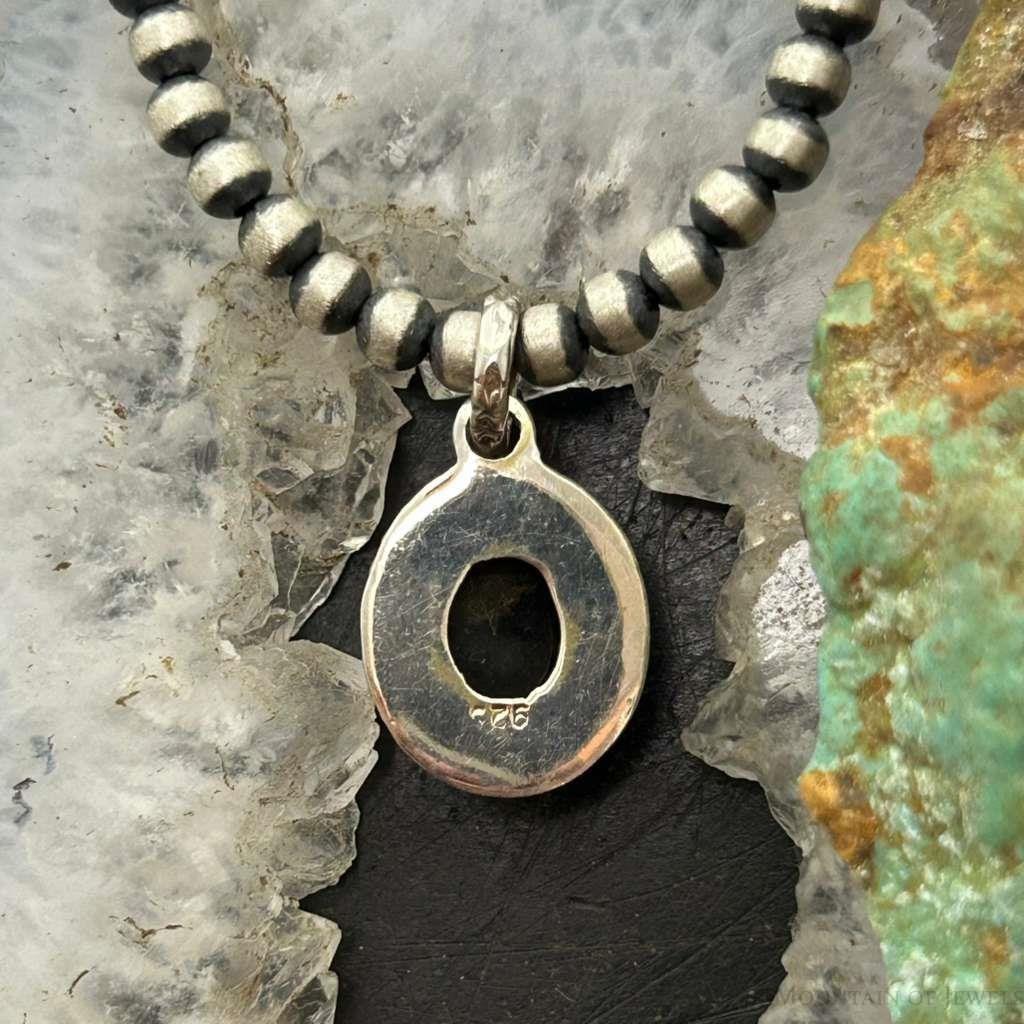 Sterling Silver Southwestern Style Oval Onyx Decorated Charm/Pendant For Women