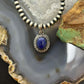 Sterling Silver Southwestern Style Oval Lapis Decorated Charm/Pendant For Women