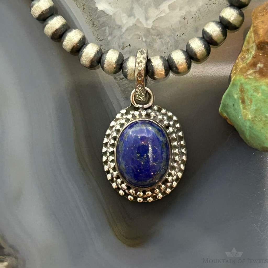 Sterling Silver Southwestern Style Oval Lapis Decorated Charm/Pendant For Women