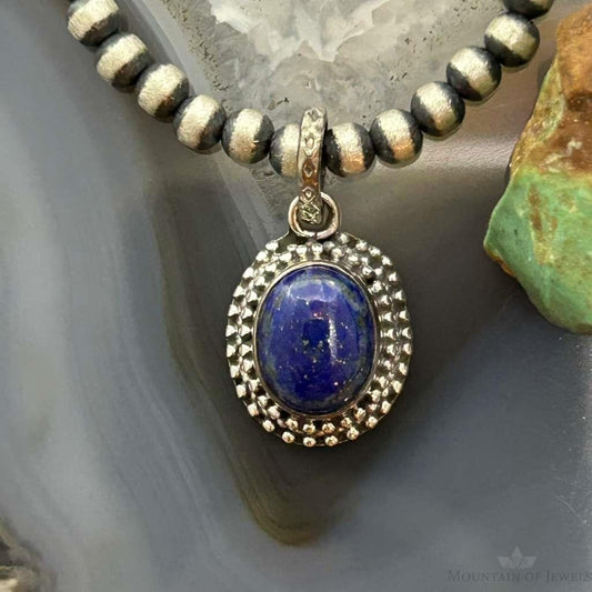 Sterling Silver Southwestern Style Oval Lapis Decorated Charm/Pendant For Women