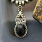 Sterling Silver Southwestern Style Oval Onyx Decorated Charm/Pendant For Women