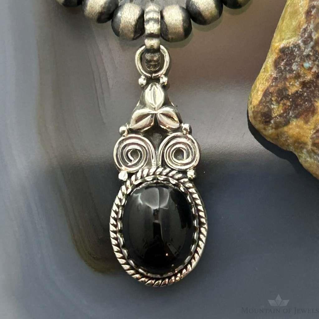 Sterling Silver Southwestern Style Oval Onyx Decorated Charm/Pendant For Women
