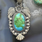 Sterling Southwestern Style Oval Sonora Gold Turquoise Leaves Decorated Pendant