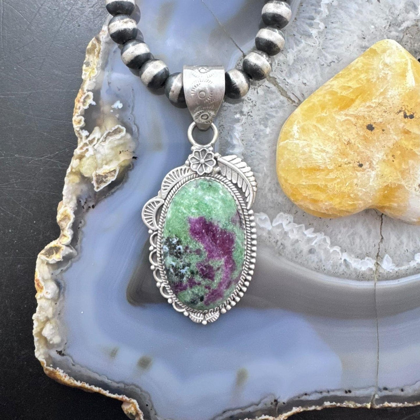 Sterling Silver Southwestern Style Elongated Oval Ruby Zoisite Decorated Pendant For Women