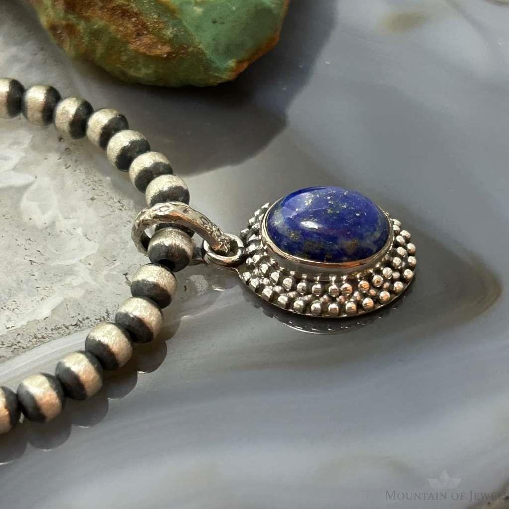 Sterling Silver Southwestern Style Oval Lapis Decorated Charm/Pendant For Women