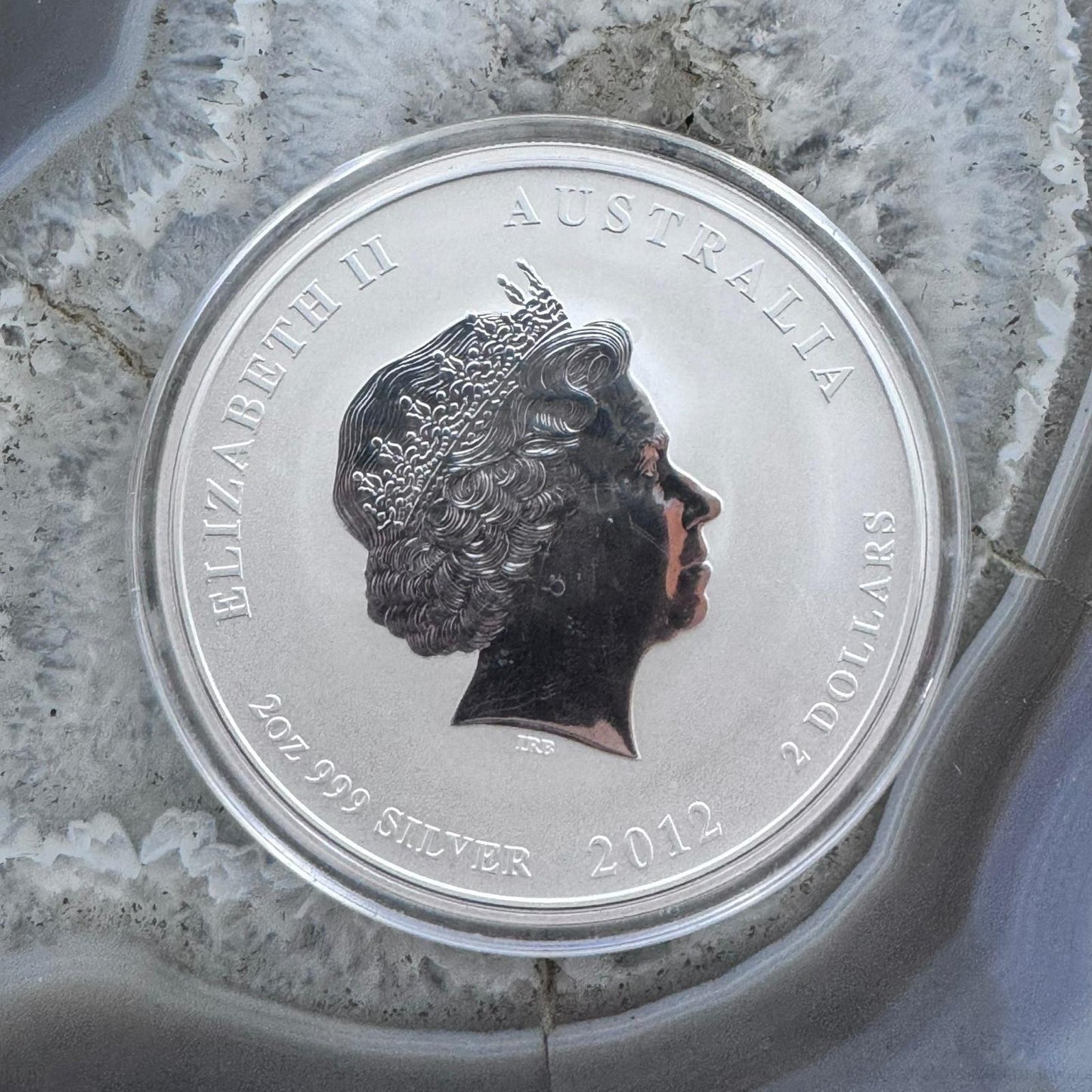 2012 Year Of The Dragon Australia 2 Ounces .999 Fine Silver Round Encapsulated.