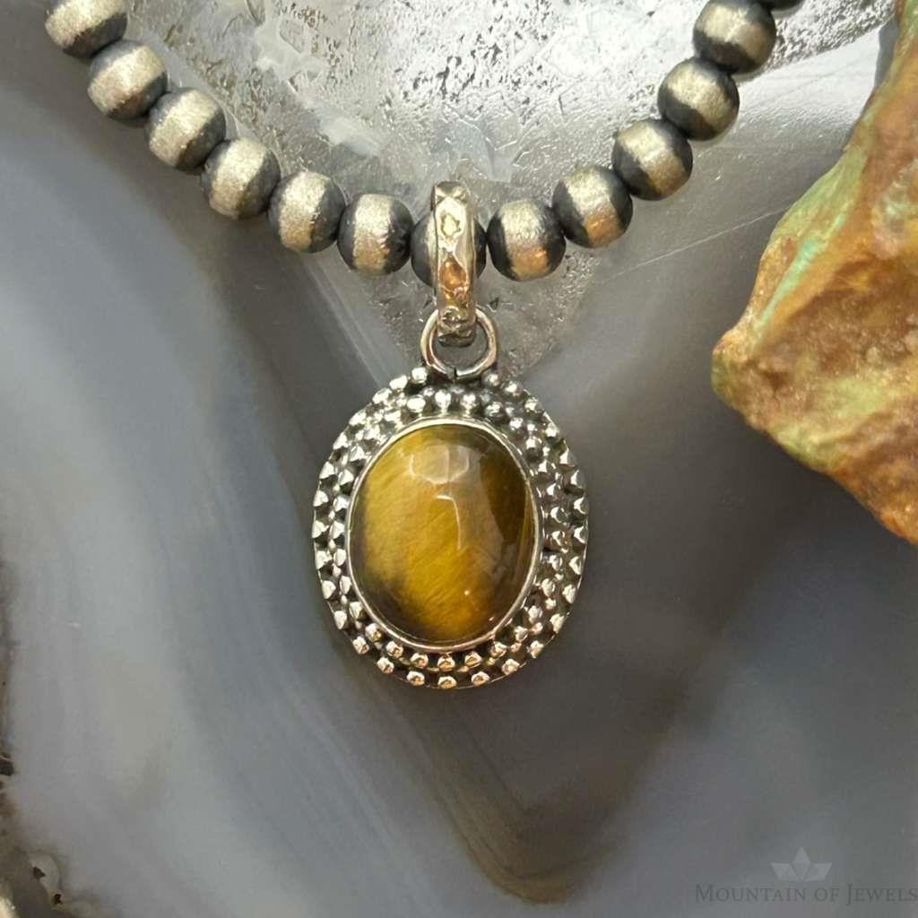 Sterling Silver Southwestern Style Oval Tiger's Eye Decorated Charm/Pendant For Women