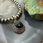 Sterling Silver Southwestern Style Oval Onyx Decorated Charm/Pendant For Women
