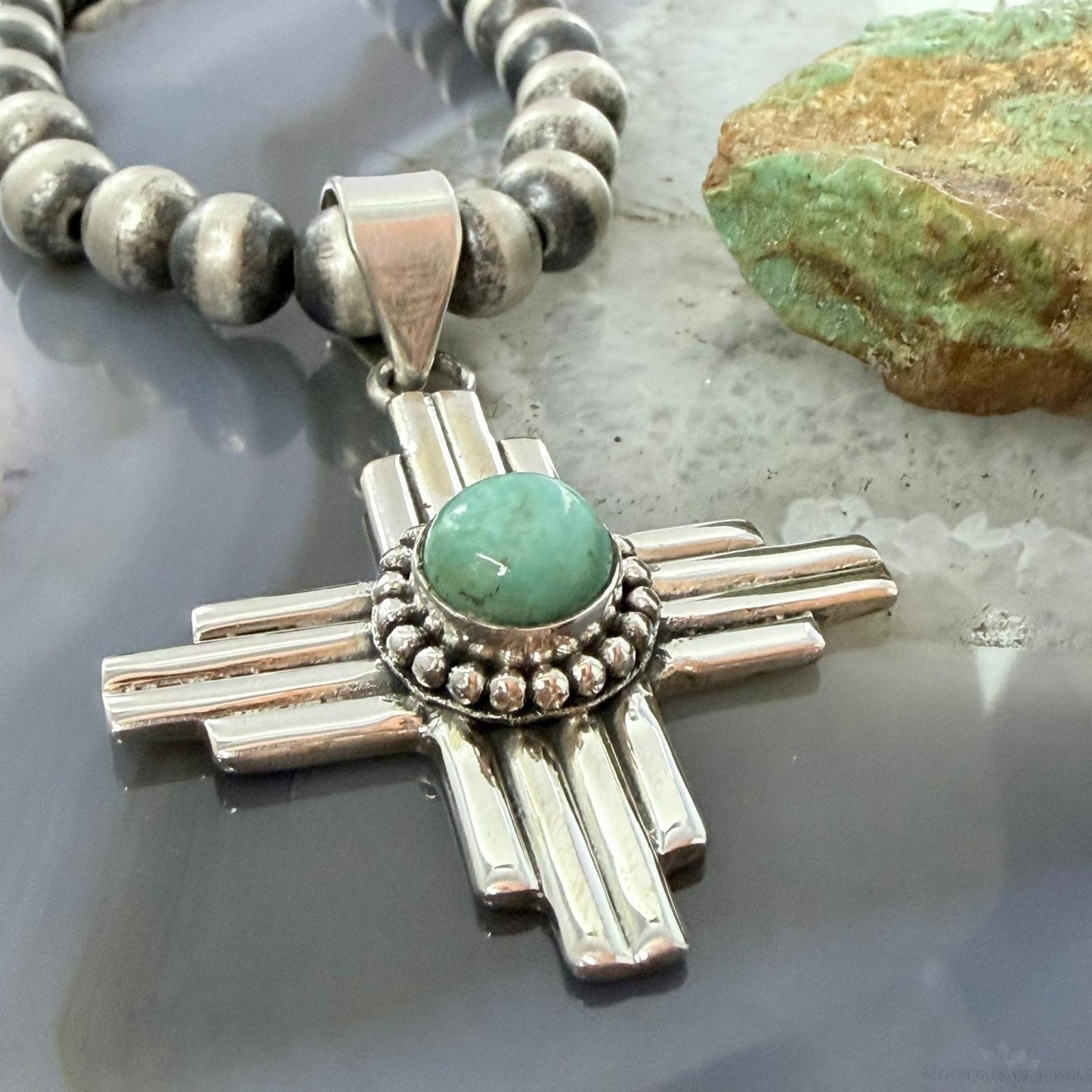 Sterling Silver Southwestern Style Teardrop Mohave Turquoise Unisex Zia Pendant