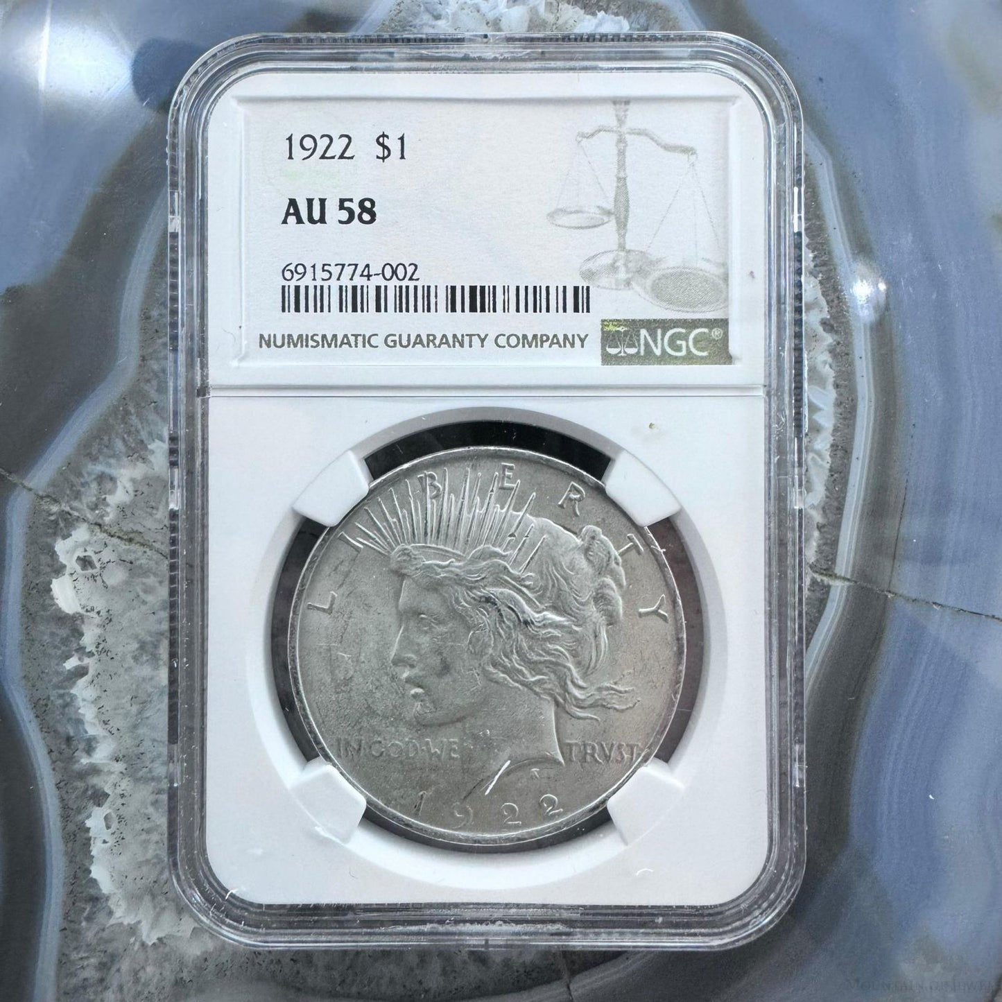 1922 US 90% Peace Silver Dollar NGC AU 58 #002-DE