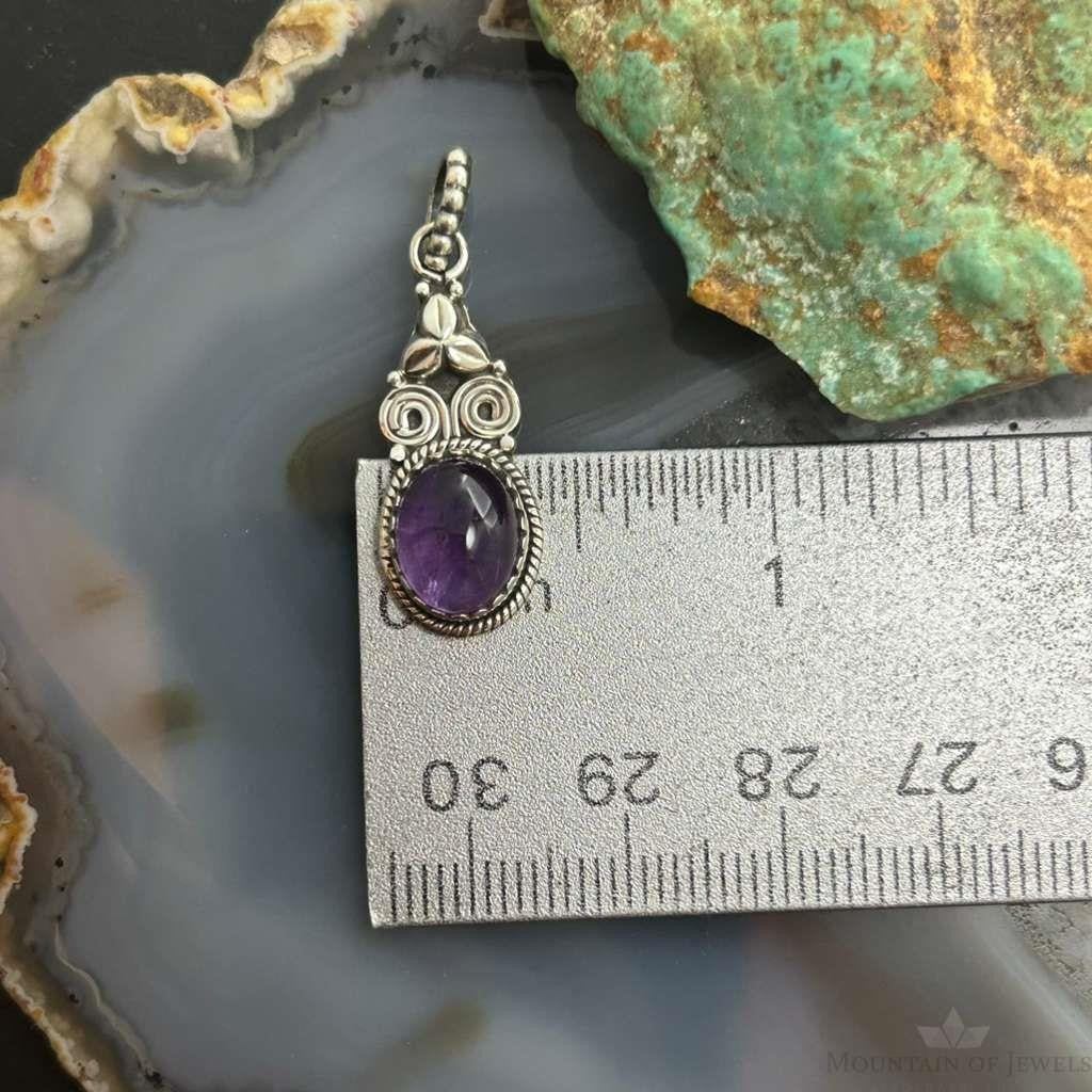 Sterling Silver Southwestern Style Oval Amethyst Decorated Charm/Pendant For Women