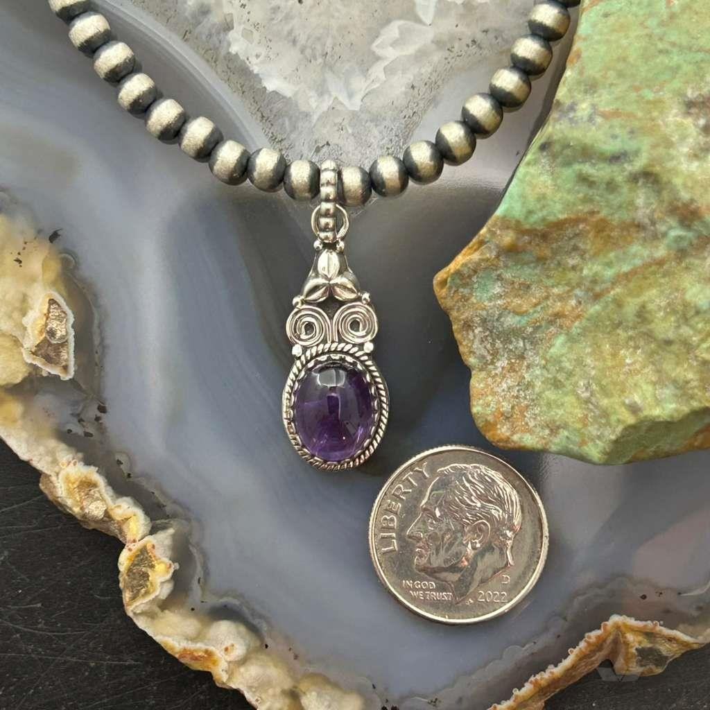 Sterling Silver Southwestern Style Oval Amethyst Decorated Charm/Pendant For Women
