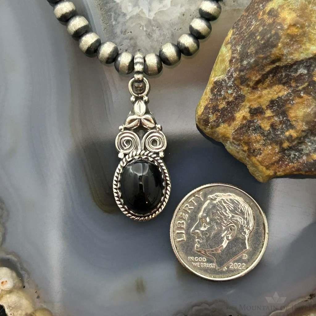 Sterling Silver Southwestern Style Oval Onyx Decorated Charm/Pendant For Women