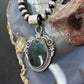 Sterling Silver Southwestern Style Oval Dark Emerald Decorated Pendant For Women