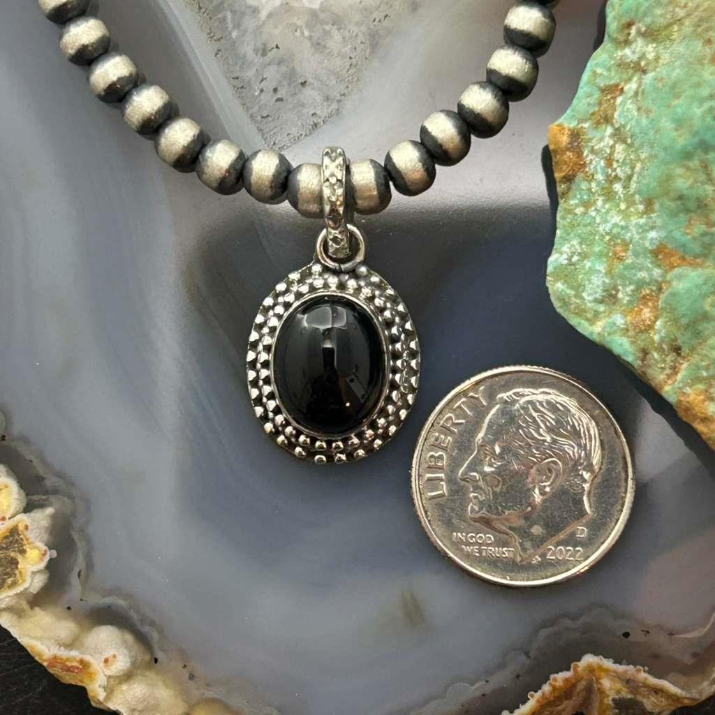 Sterling Silver Southwestern Style Oval Onyx Decorated Charm/Pendant For Women