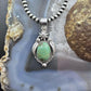 Sterling Silver Southwestern Style Oval Turquoise Leaves Decorated Pendant For Women