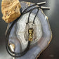 Sid Bell Tully NY Bronze & Pewter Man Inside Bear Decorated Bolo Tie For Men