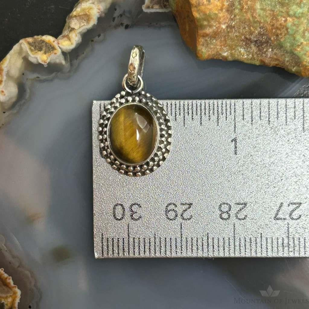 Sterling Silver Southwestern Style Oval Tiger's Eye Decorated Charm/Pendant For Women