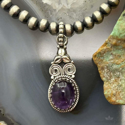 Sterling Silver Southwestern Style Oval Amethyst Decorated Charm/Pendant For Women