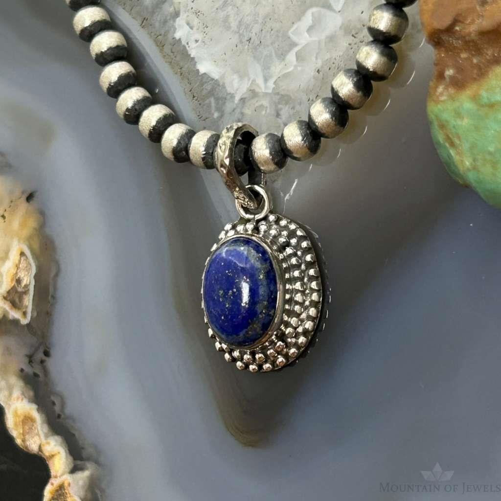 Sterling Silver Southwestern Style Oval Lapis Decorated Charm/Pendant For Women