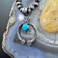 Kevin Billah Sterling Silver Natural Kingman Turquoise Decorated Naja Unisex Pendant