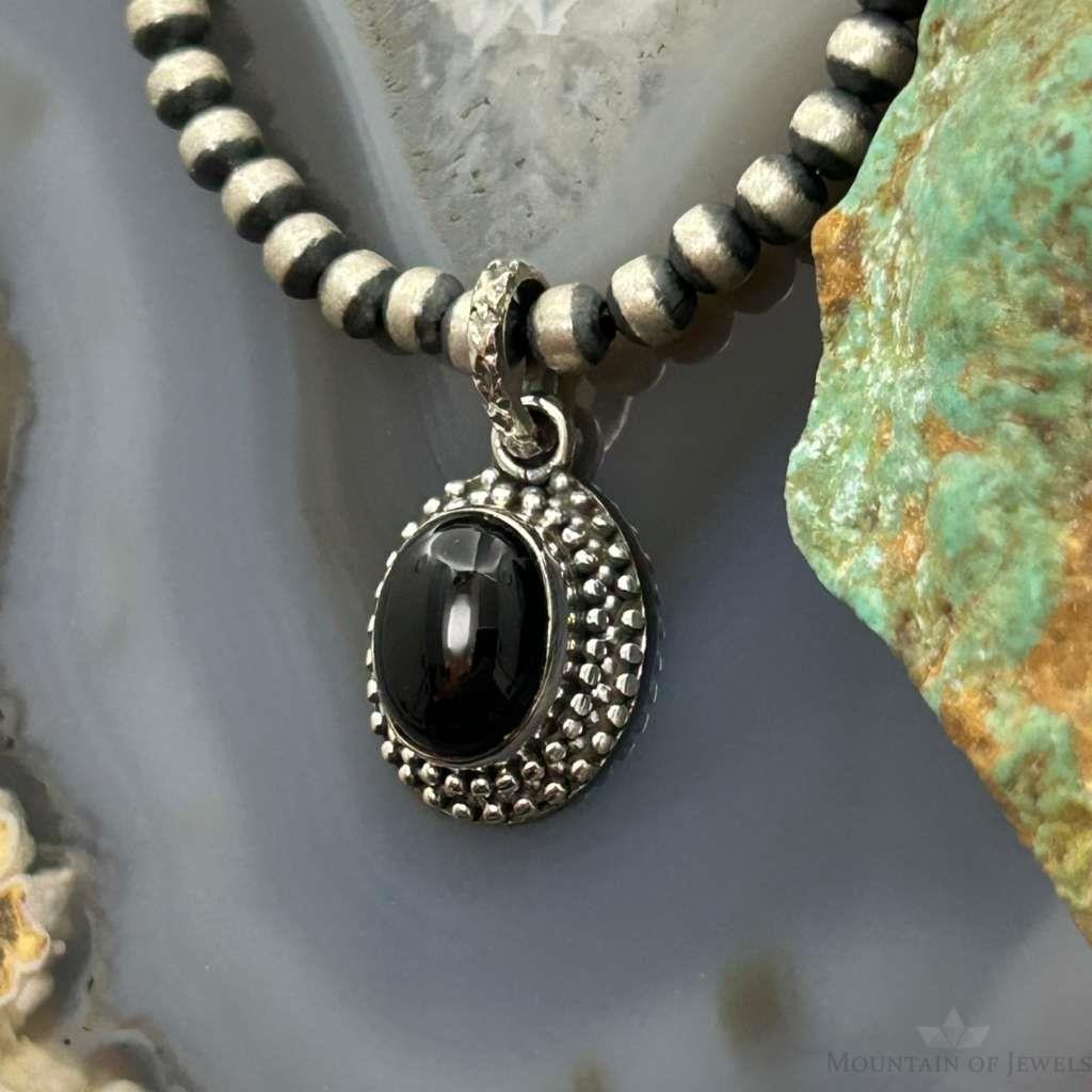 Sterling Silver Southwestern Style Oval Onyx Decorated Charm/Pendant For Women