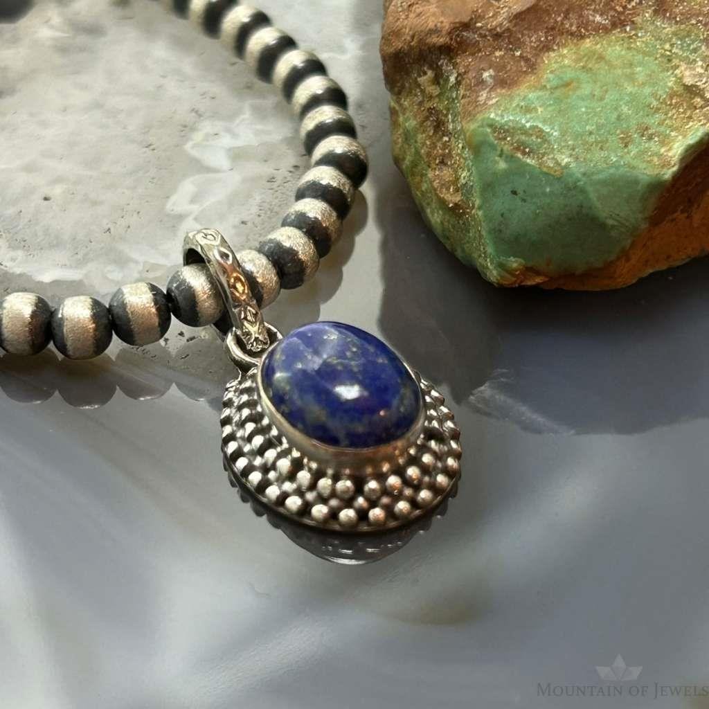 Sterling Silver Southwestern Style Oval Lapis Decorated Charm/Pendant For Women