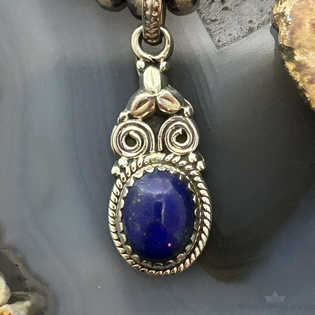Sterling Silver Southwestern Style Oval Lapis Decorated Charm/Pendant For Women
