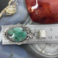 Sterling Silver Southwestern Style Oval Emerald Decorated Pendant For Women