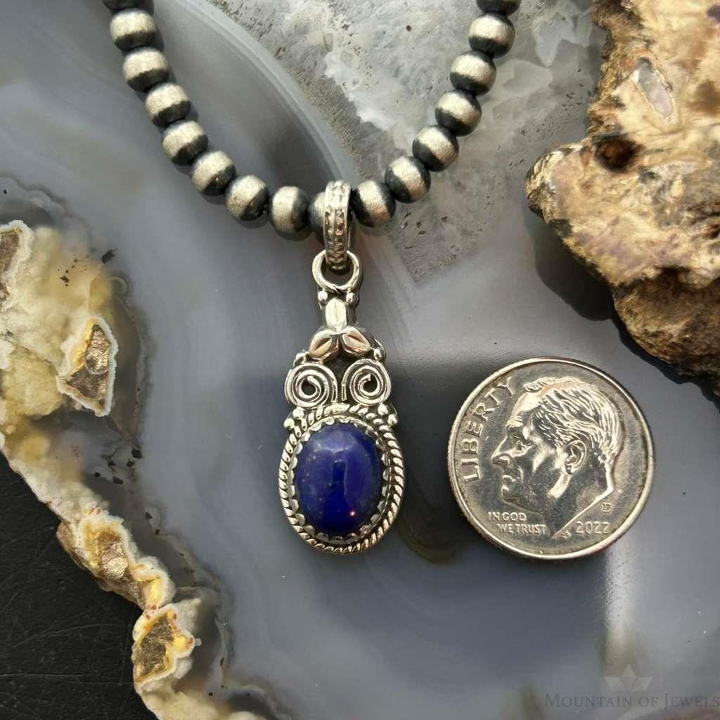 Sterling Silver Southwestern Style Oval Lapis Decorated Charm/Pendant For Women