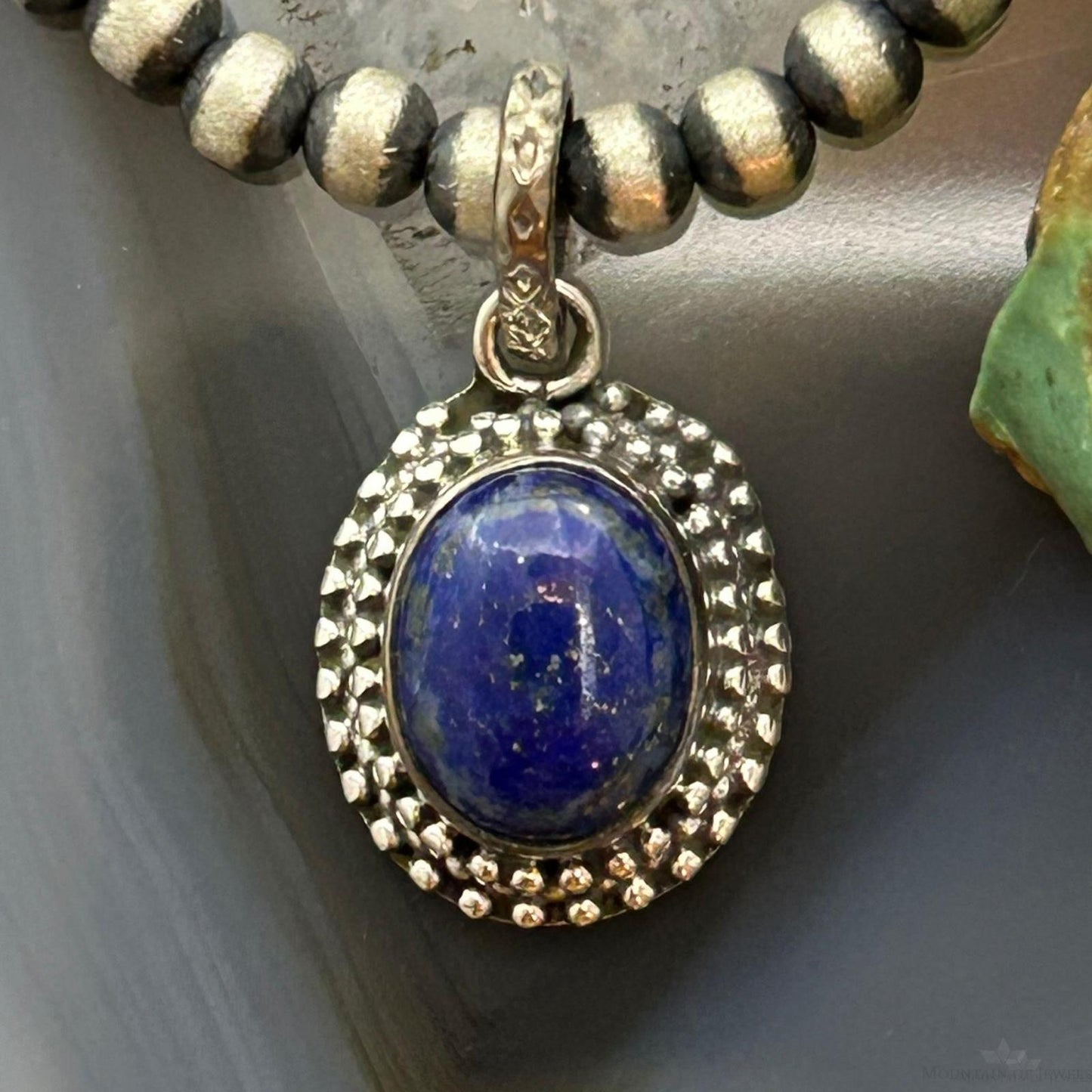 Sterling Silver Southwestern Style Oval Lapis Decorated Charm/Pendant For Women