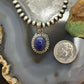 Sterling Silver Southwestern Style Oval Lapis Decorated Charm/Pendant For Women