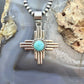 Sterling Silver Southwestern Style Rounded Mohave Turquoise Unisex Zia Pendant