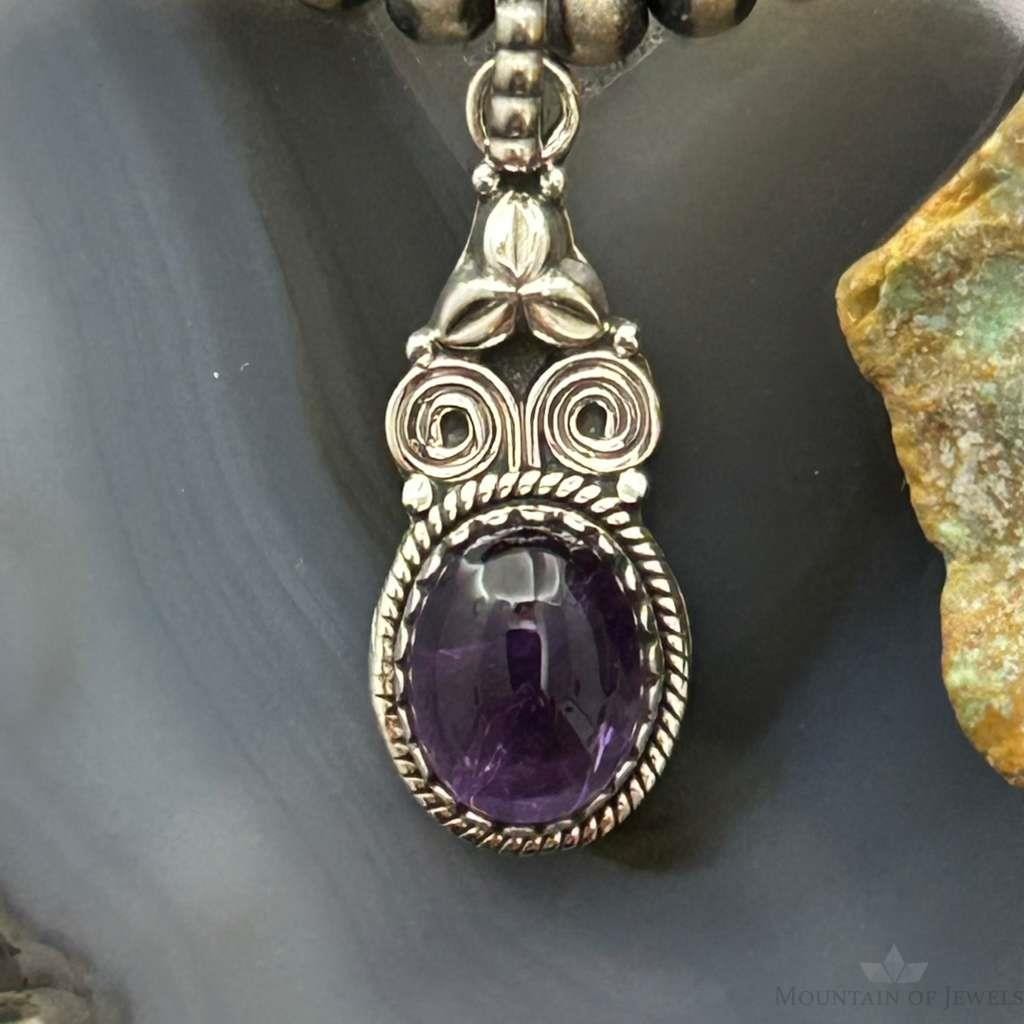 Sterling Silver Southwestern Style Oval Amethyst Decorated Charm/Pendant For Women