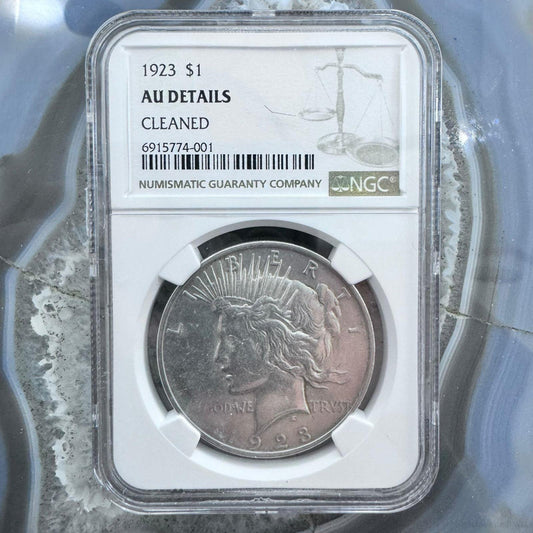 1923 US 90% Peace Silver Dollar NGC AU DETAILS Cleaned #6915774-001DE